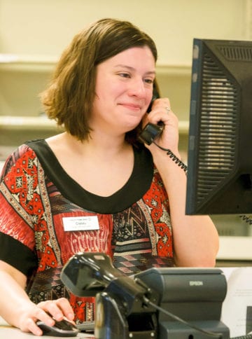 librarian on phone - photo by Paul Conrad