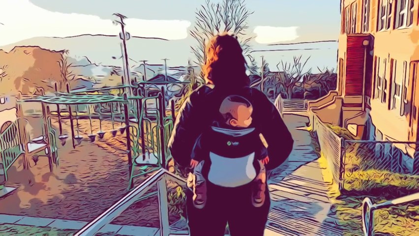 woman from behind with infant in backpack